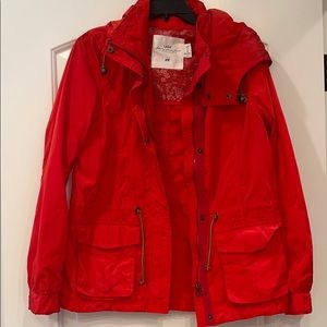 H & M red raincoat brand new without tags.